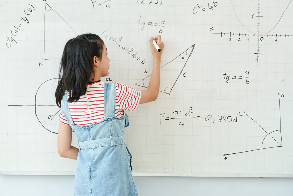 children solving psle maths